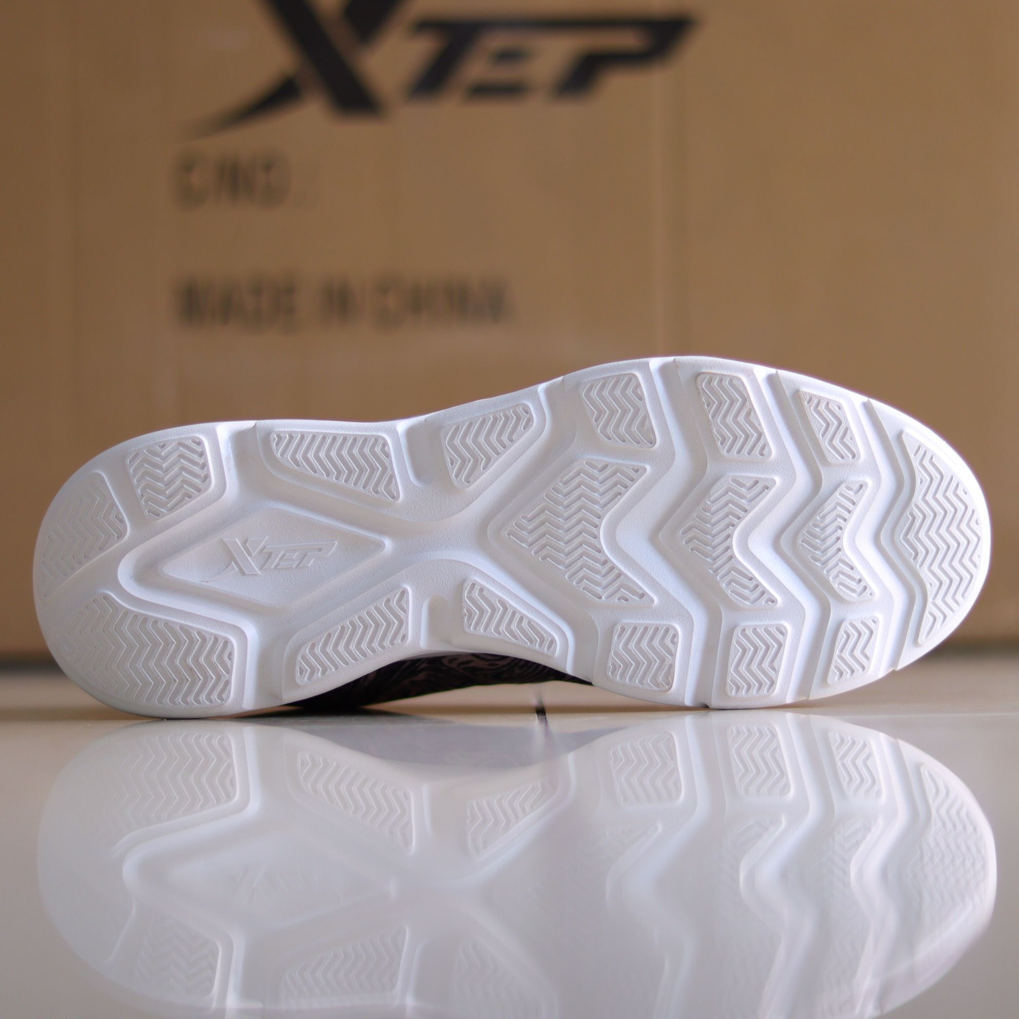 X31 - Women's Medicated Running Shoe by Xtep®