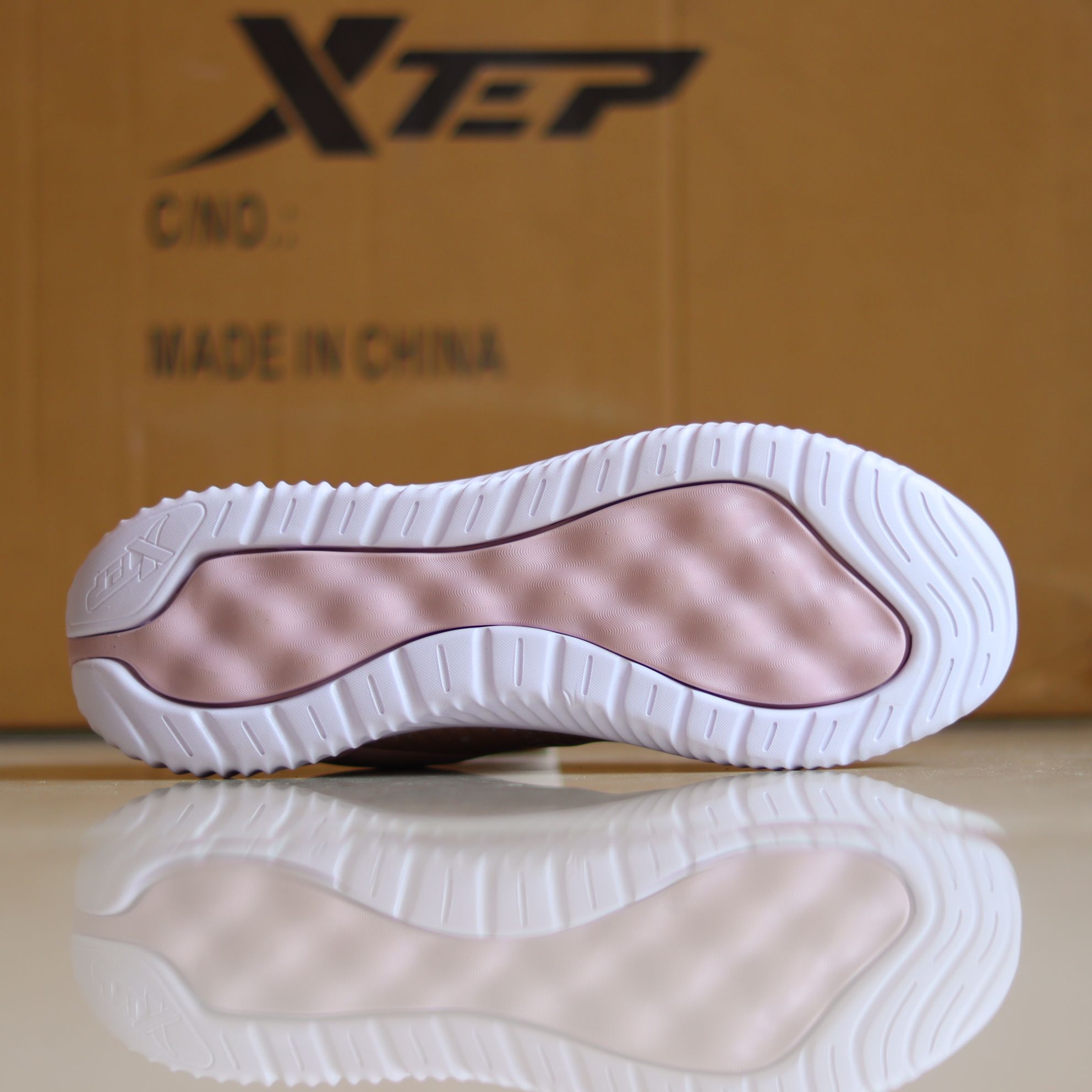 X54 - Women's Medicated Running Shoe by Xtep